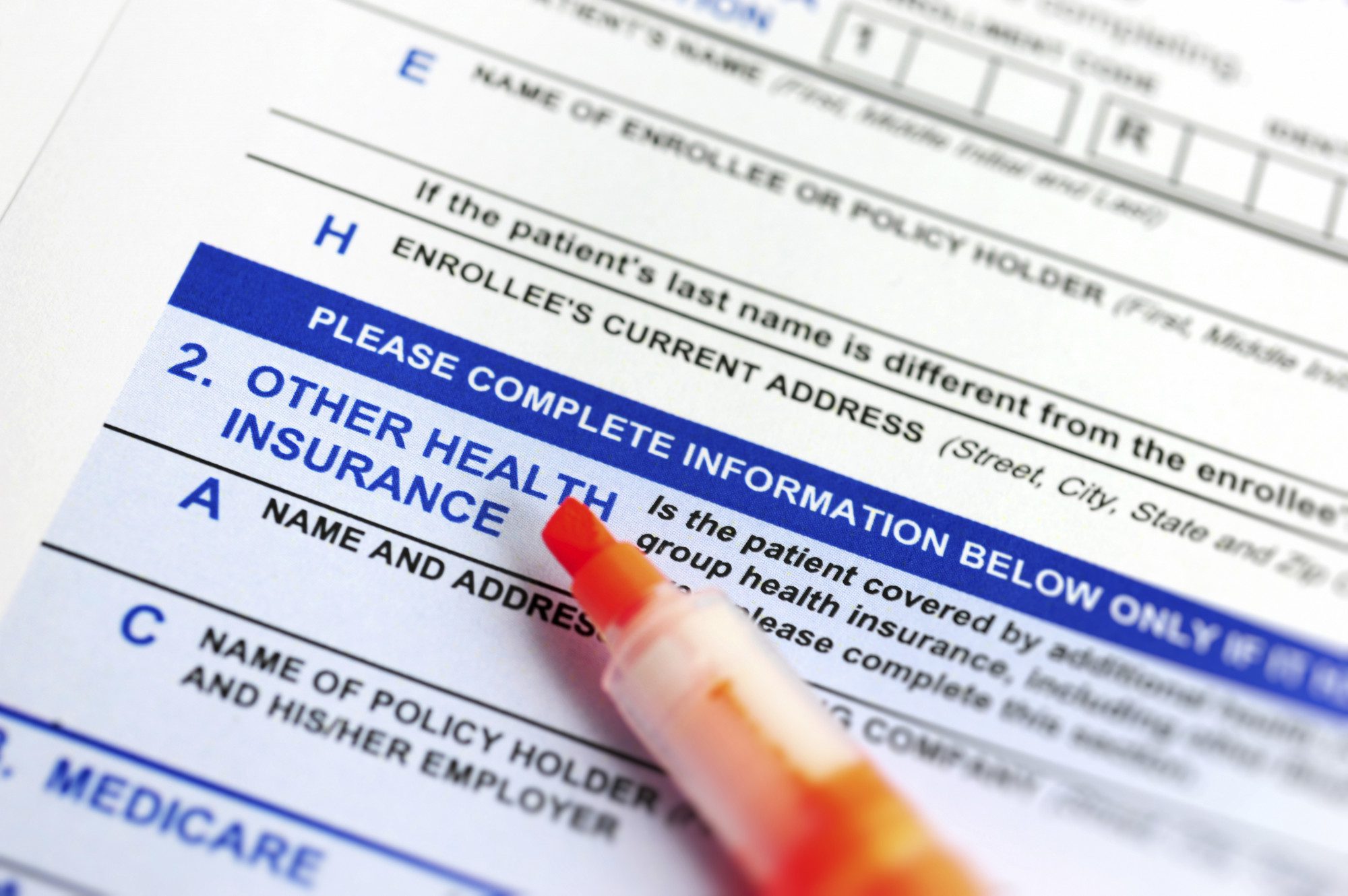 Close-up of health insurance form highlighting therapy cap exceptions section.