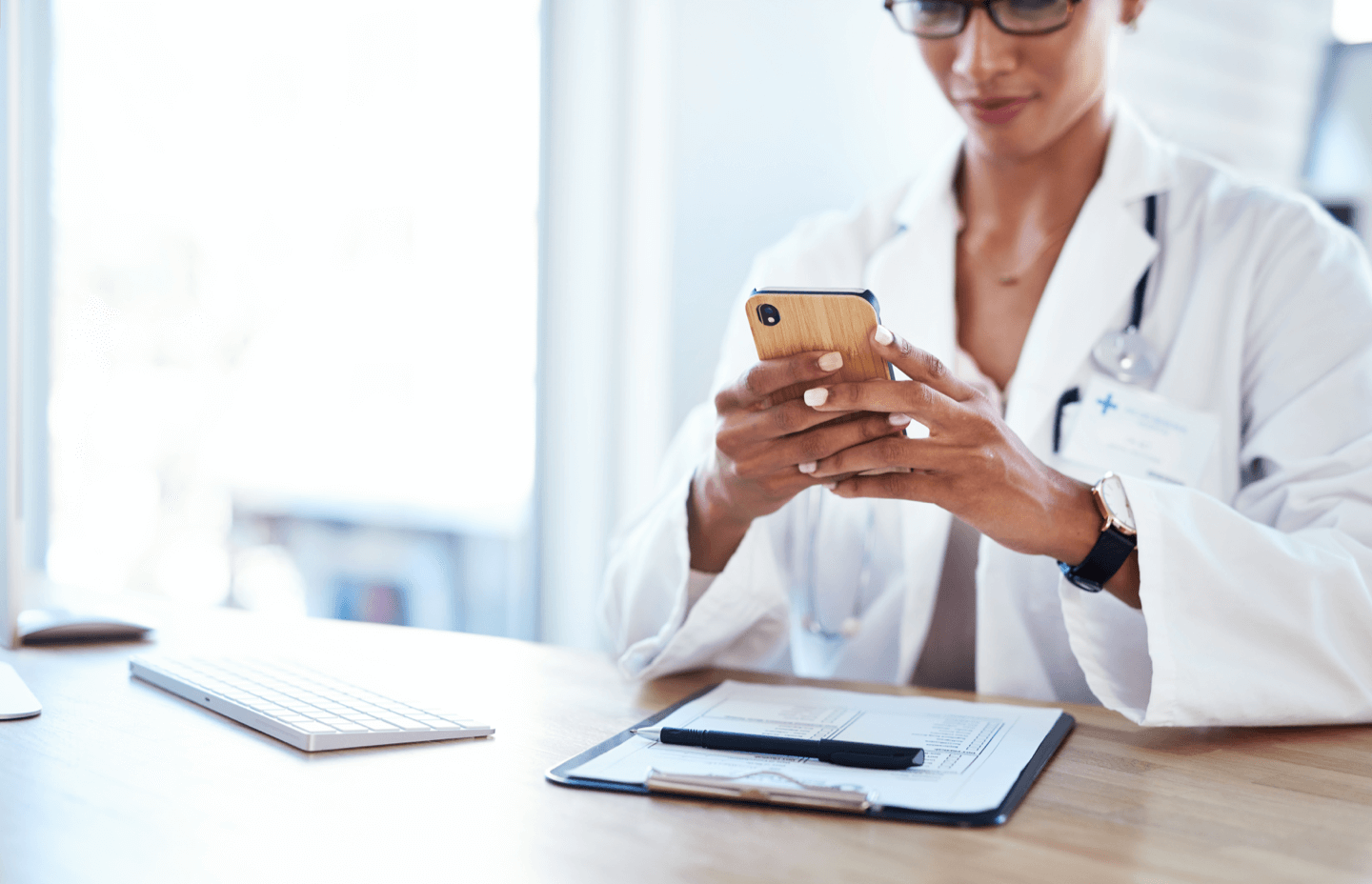 Clinic doctor texting patient back